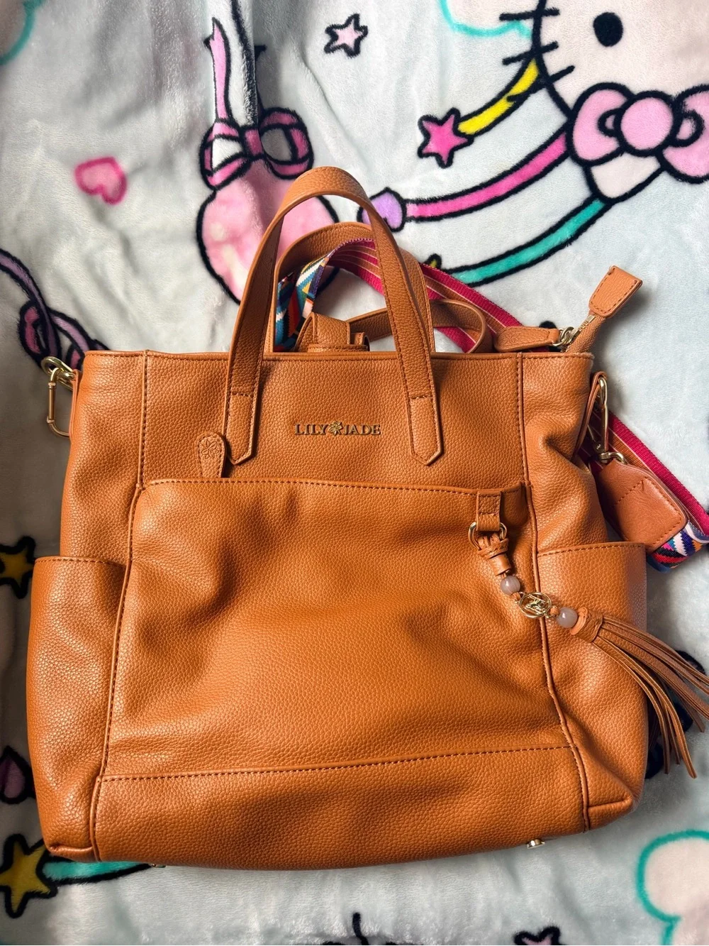 Lily & Jade Tan Leather Tote with Tassel and Colorful Strap